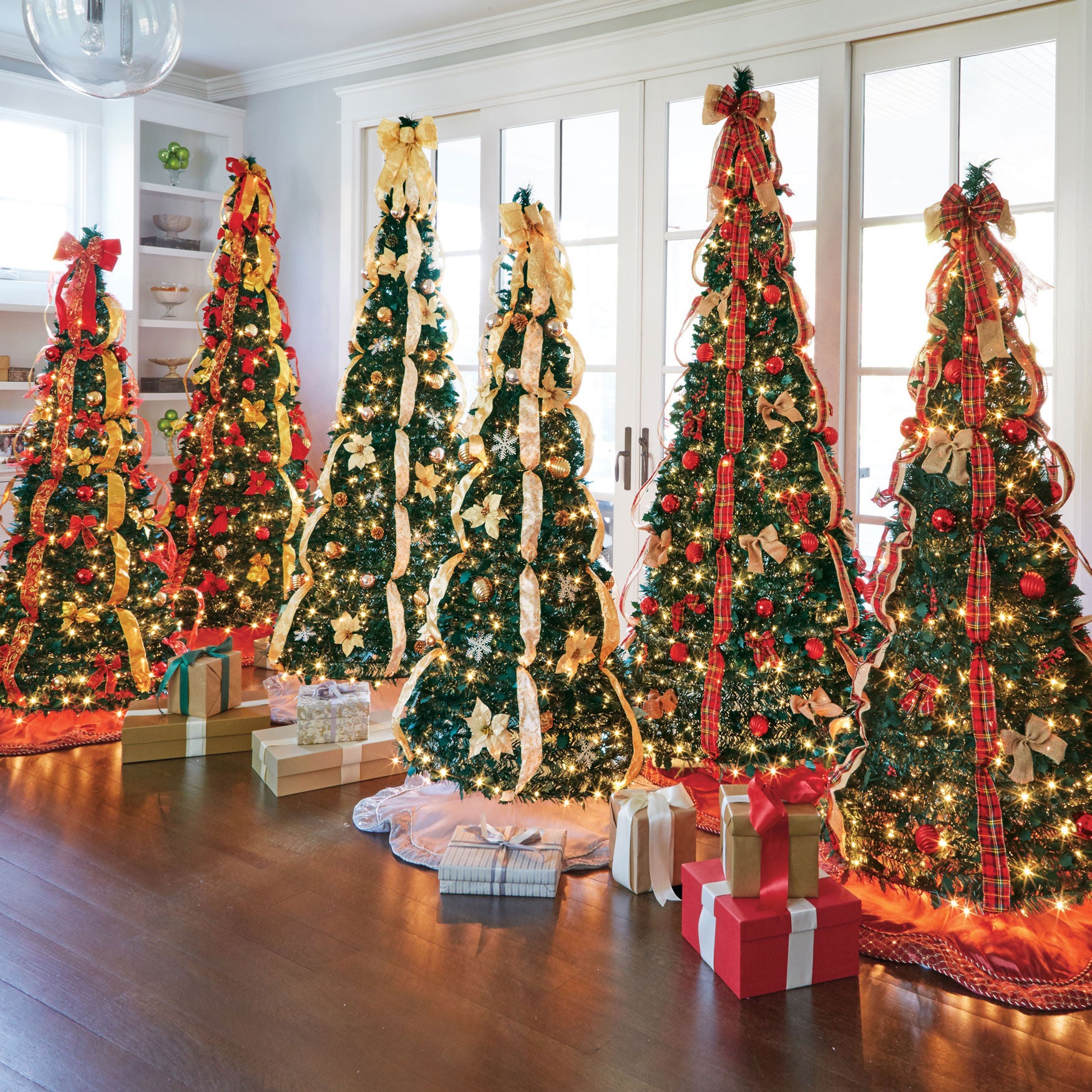 Pre lit and decorated christmas trees top