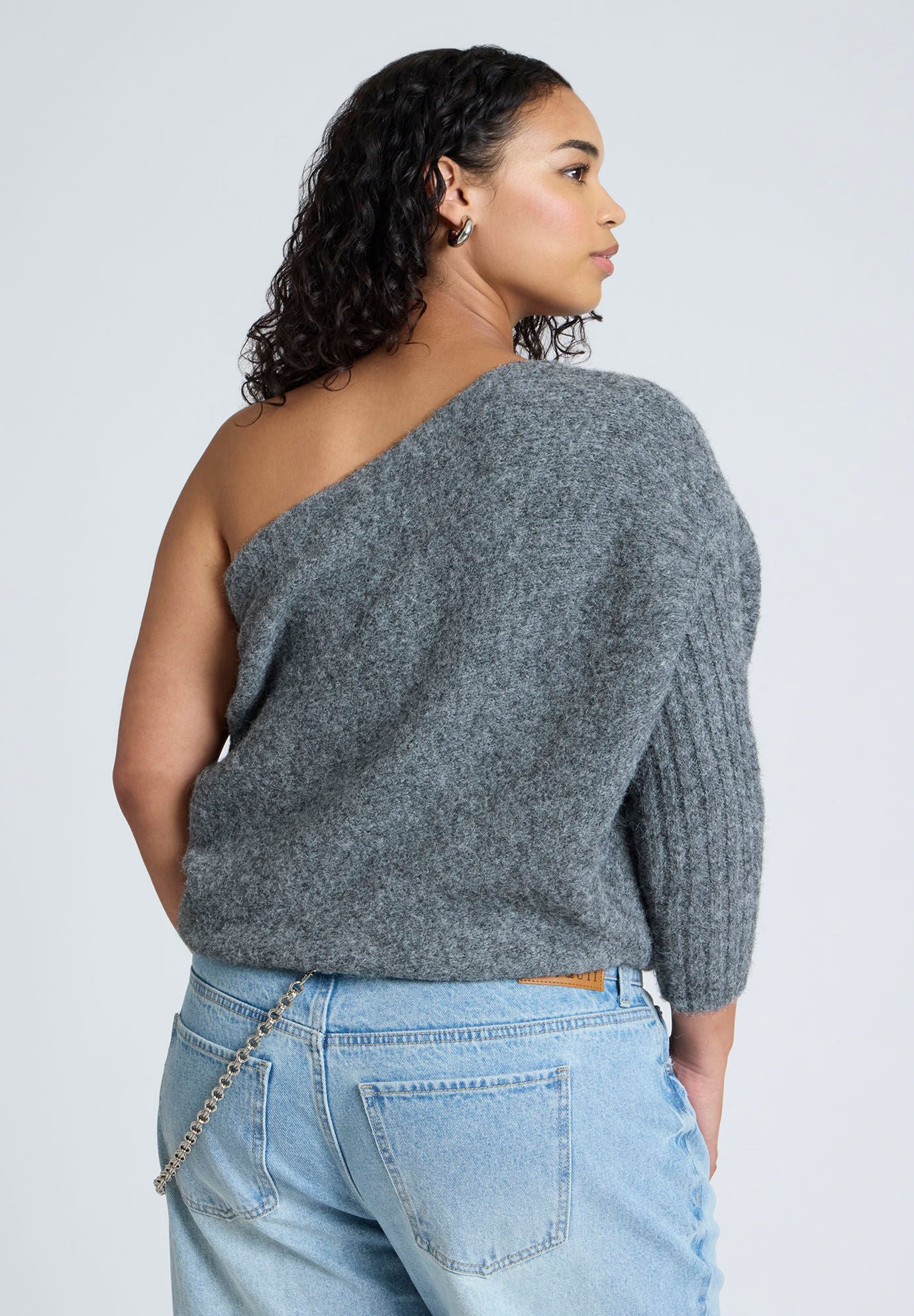 One sleeve sweater top
