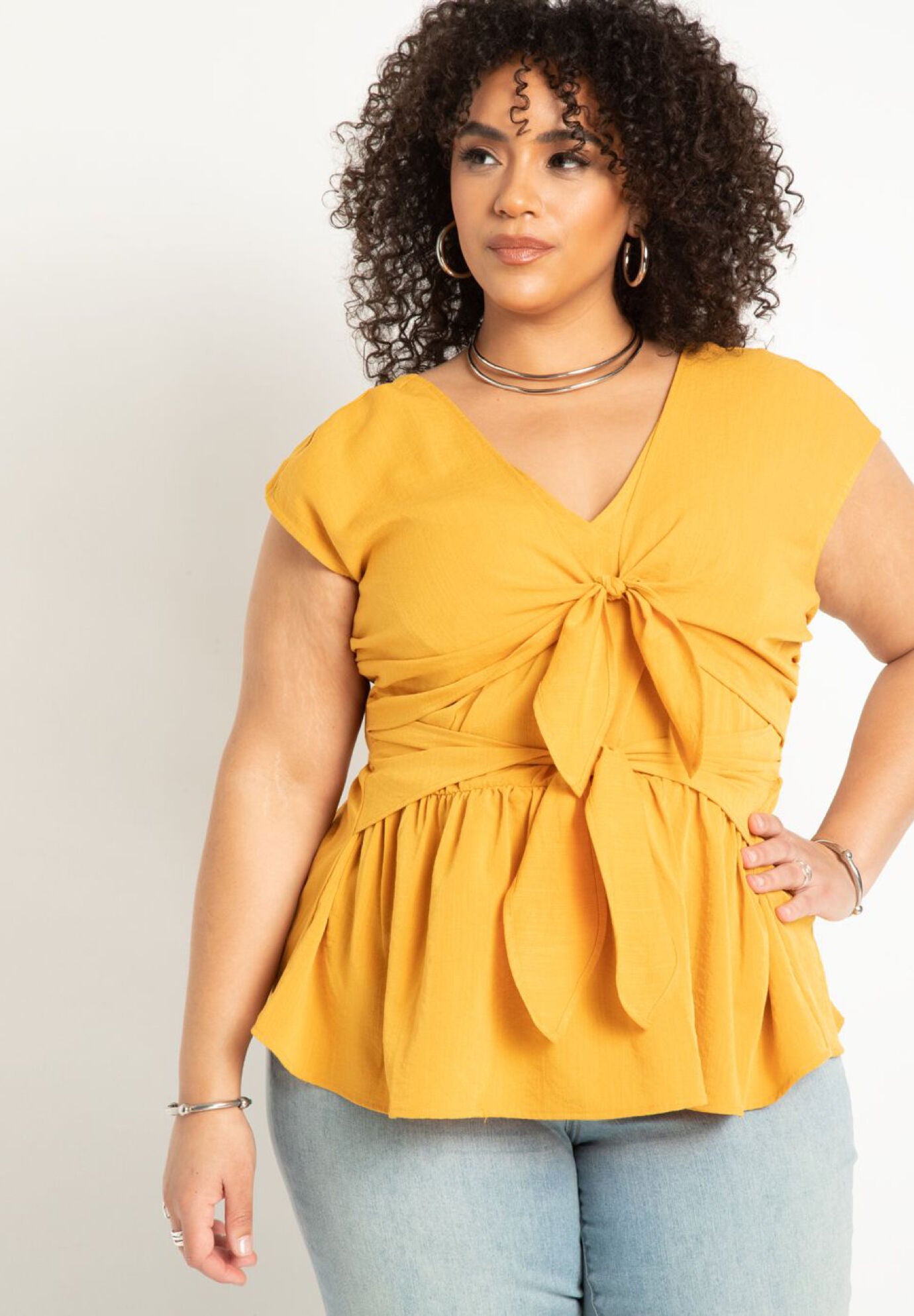 Bow Detail Peplum Blouse