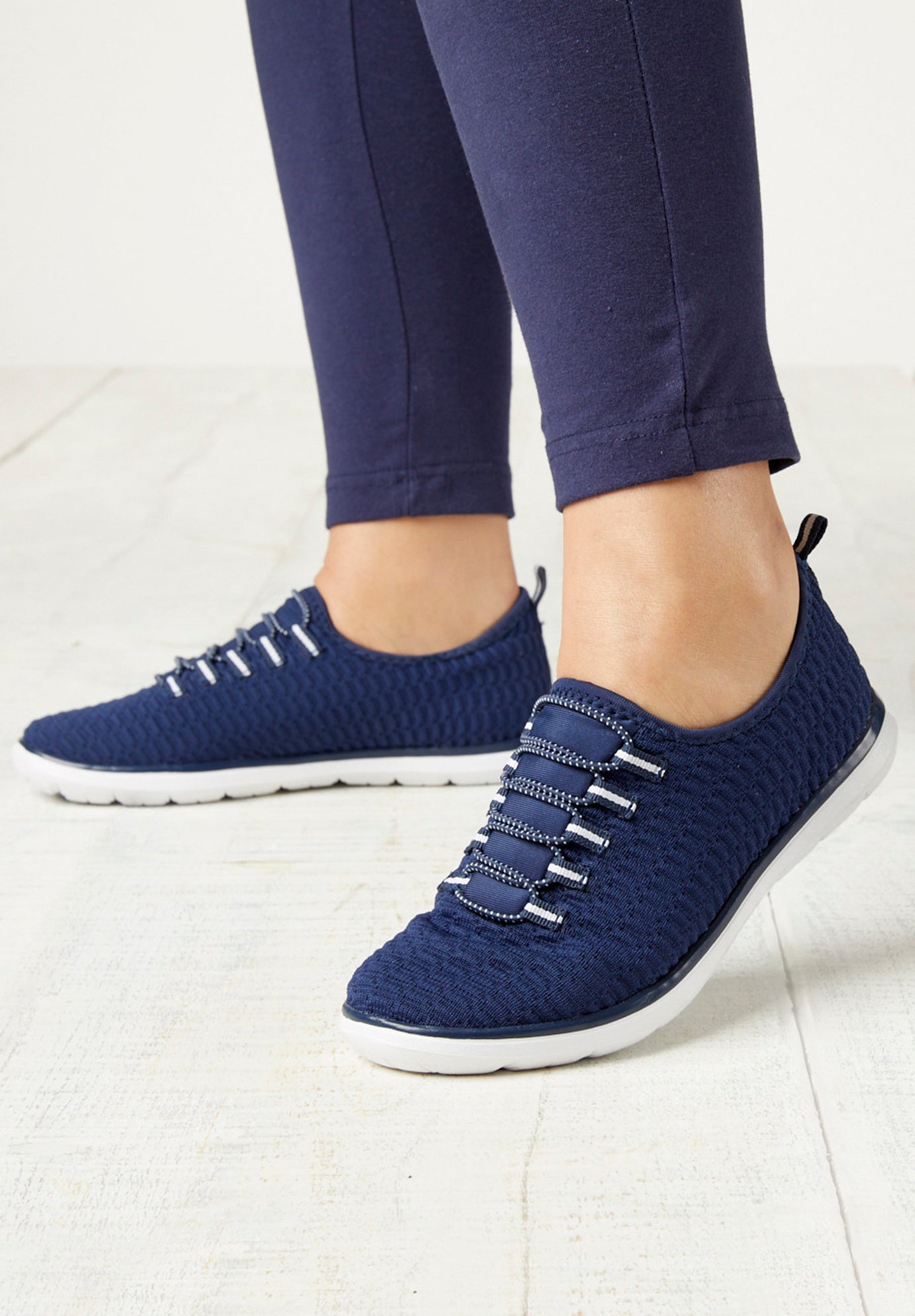 The CV Sport Ariya Textured Knit Slip On Sneaker