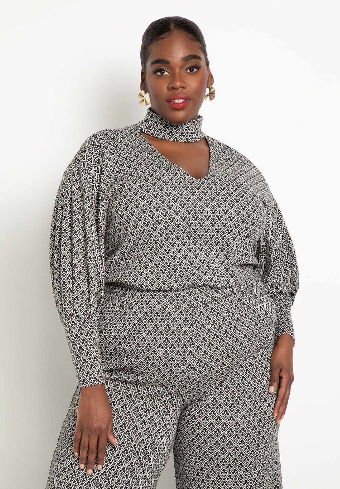 Puff Sleeve Top With Cutout Neck image number 0